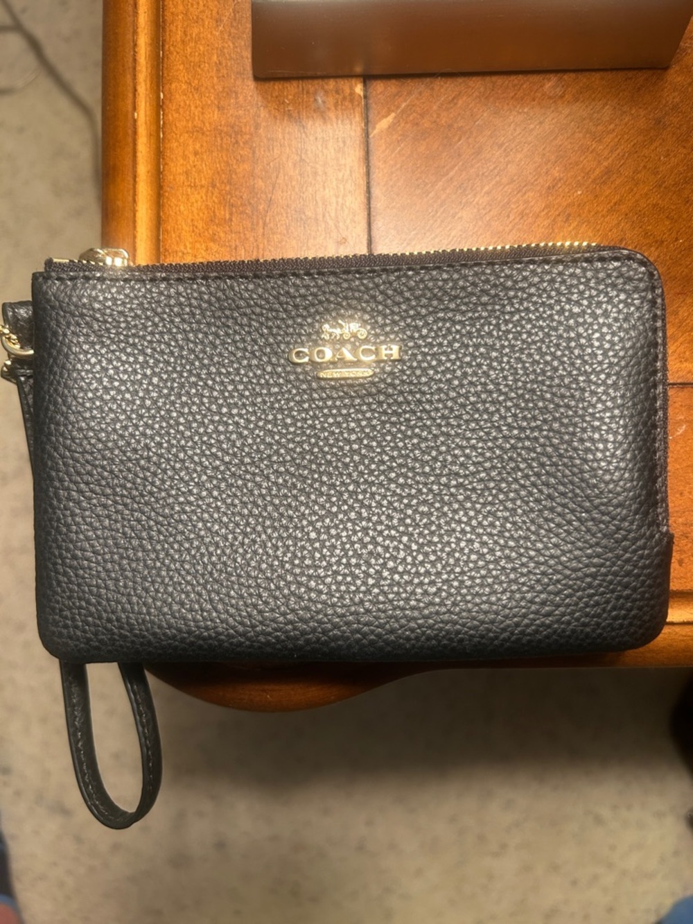 Coach Black Pebbled Leather Wristlet with Gold Tone Logo